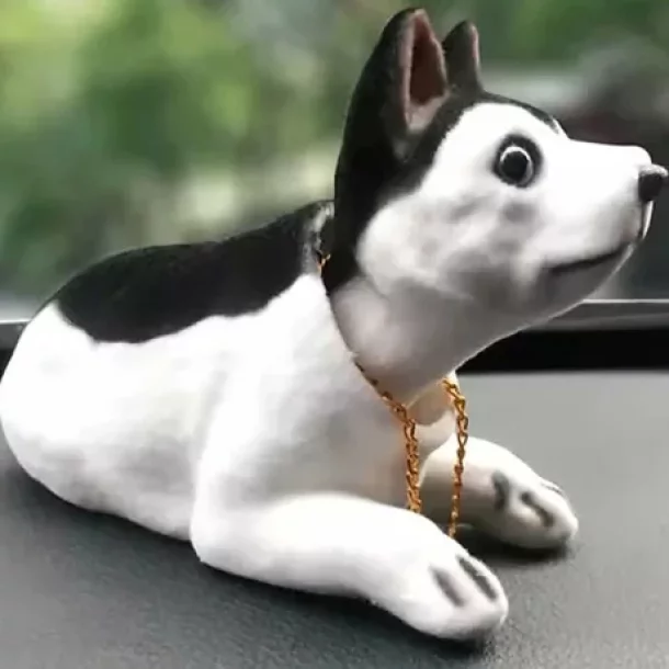 Caine care da din cap - Husky